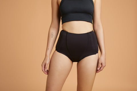 Black Adaptive Leakproof Underwear from Slick Chicks, offering comfort and easy wear.