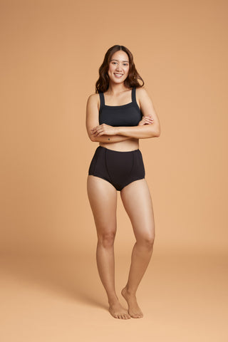 Black Adaptive Leakproof Underwear from Slick Chicks, offering comfort and easy wear.